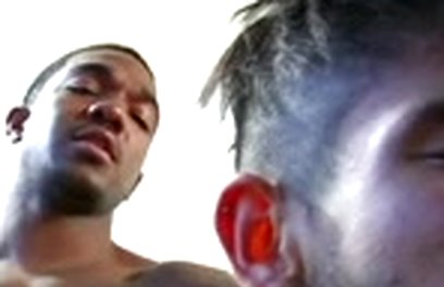 Latino boy between two pieces of black meat