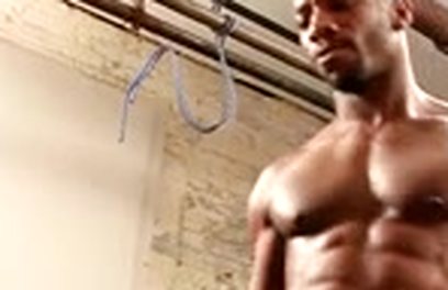 Black muscle man plays with a white ass