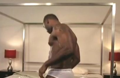 Ebony muscle man Nubuis strokes his black cock.